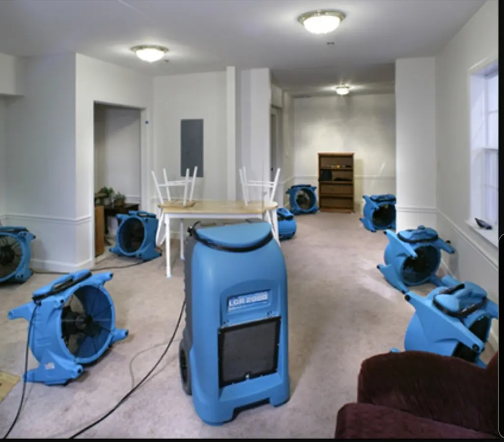 Air movers and dehumidifier setup for Water Damage Restoration in Forestbrook